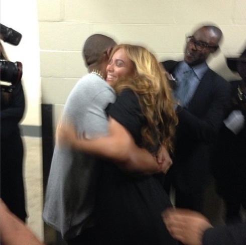 Jay greeting Bey after her halftime performance